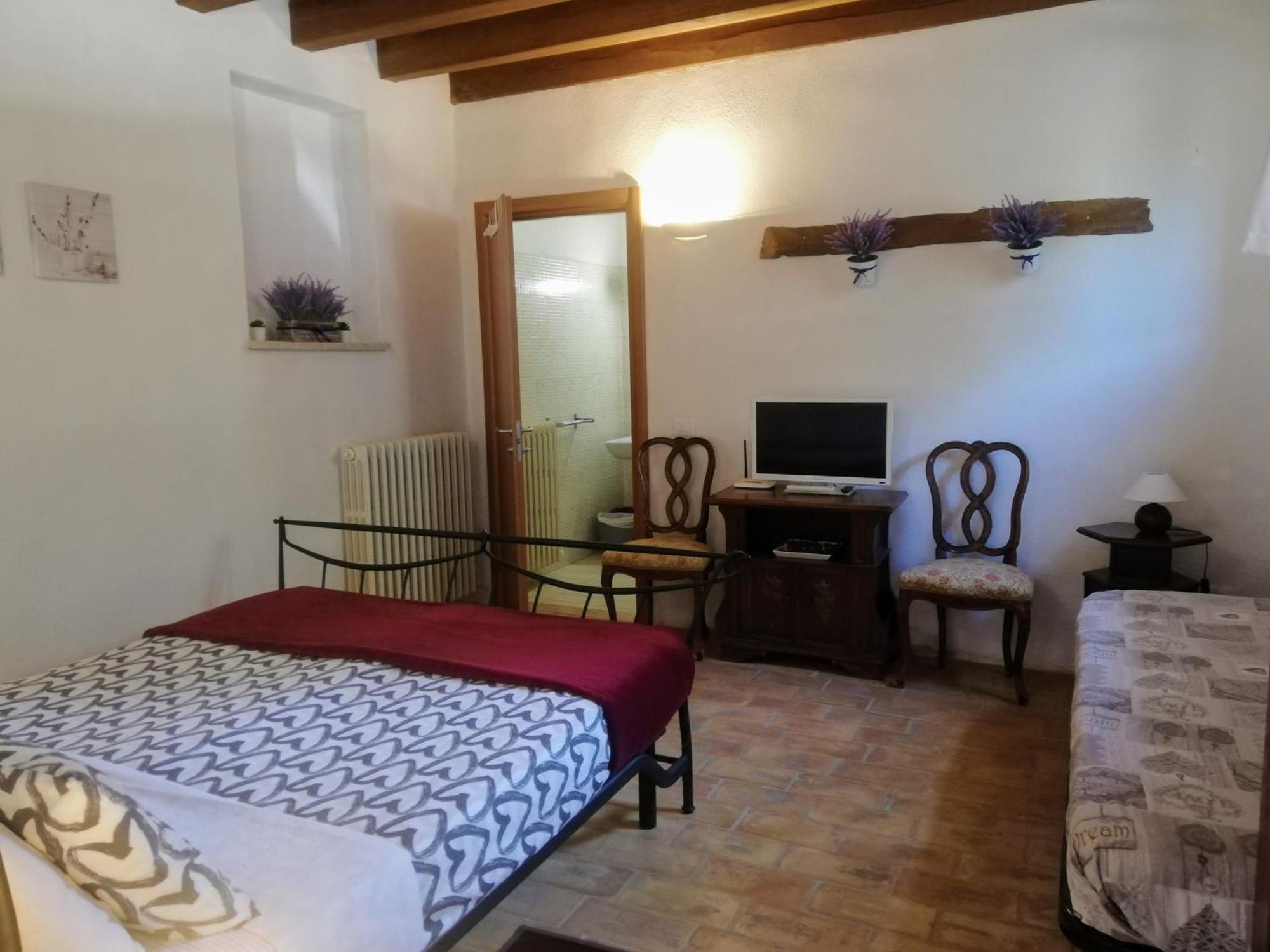 Le Ginestre Apartments Assisi Szoba fotó